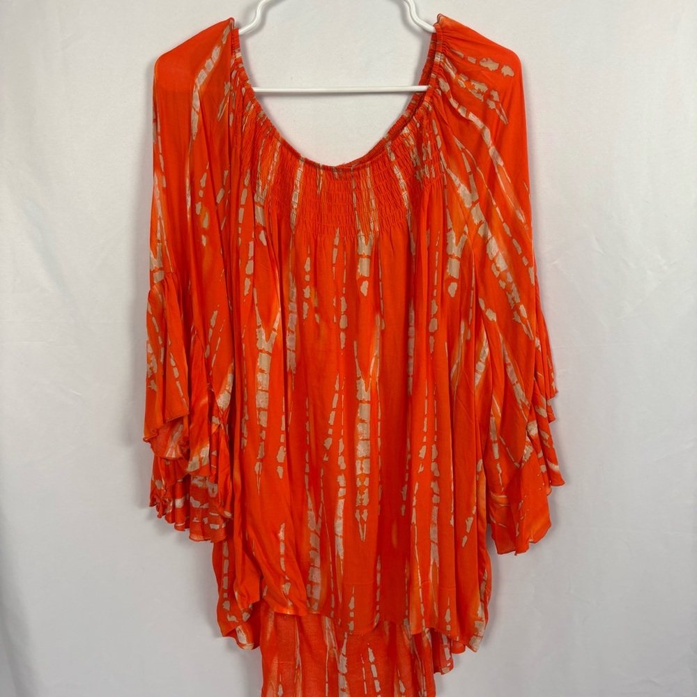 No label 
XL 
Very slowly, bright orange may be a great bathing suit cover